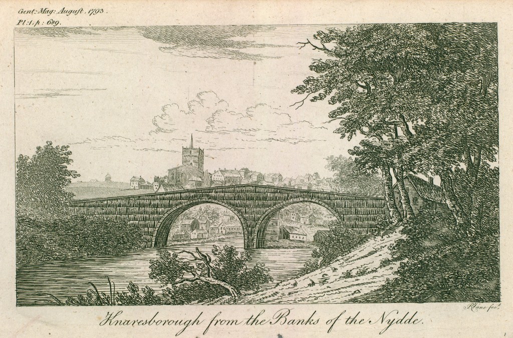 This etching shows a bridge over the River Nidd with trees and vegetation on the right bank. The town of Knaresborough can be seen in the background beyond the bridge.